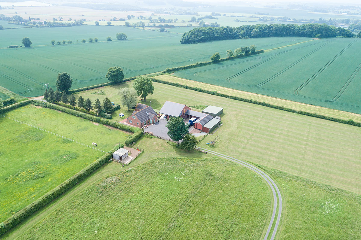  Aerial view of Pear Tree Farm near Wakefield with surrounding countryside – Lucas Media 