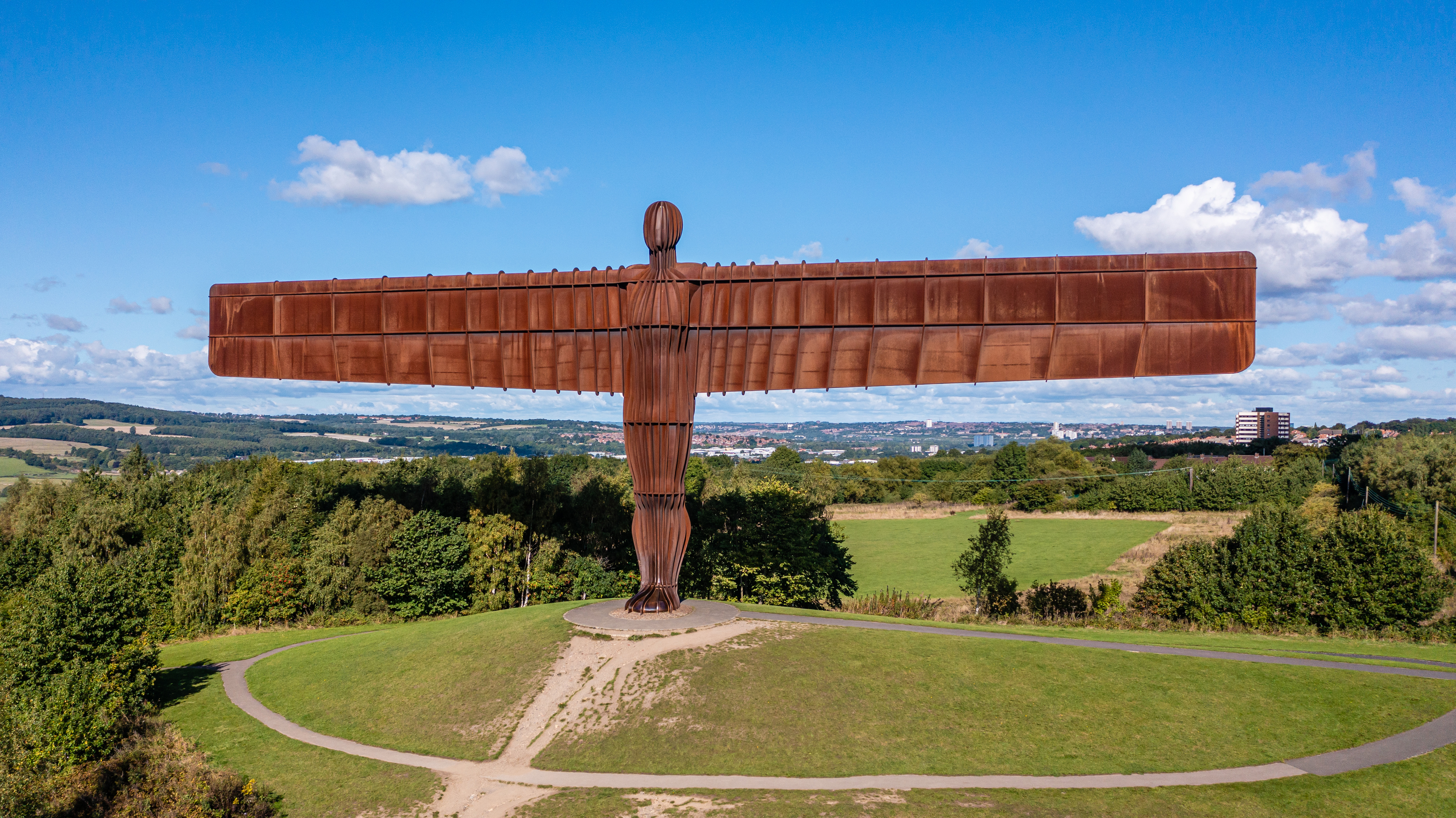  Aerial view of Angel of the North in Gateshead with blue sky – by Lucas Media 